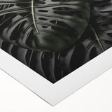 Botanical wall art featuring a vibrant Monstera leaf design on rolled canvas, showcasing rich green hues and intricate details, perfect for home decor enhancement.