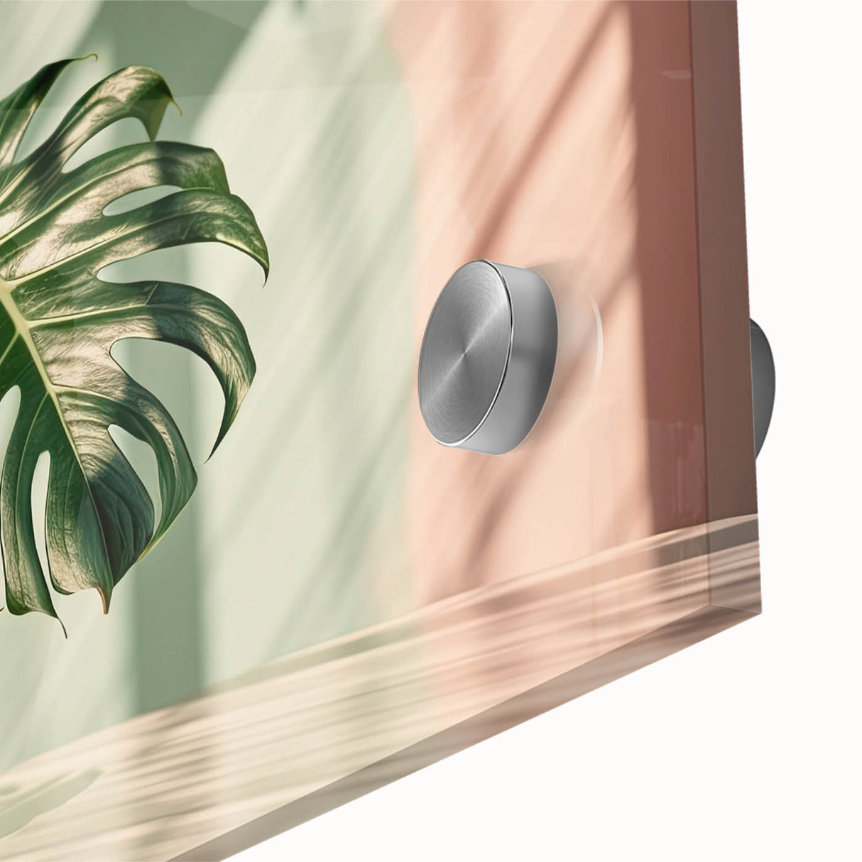 Close-up of a vibrant botanical wall art piece featuring a Monstera design, showcasing lush green leaves against a soft background, ideal for home decor. This acrylic glass artwork adds a touch of nature-inspired elegance to any space.