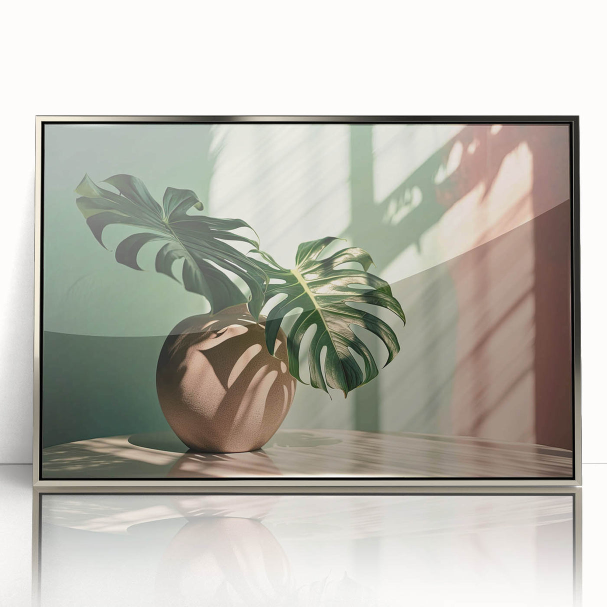 Framed acrylic wall art featuring a vibrant botanical monstera design, with silver accents and a sleek front view, perfect for modern home decor.