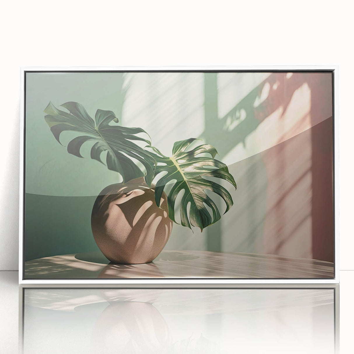 Framed wall art featuring a botanical monstera design in vibrant green hues, displayed in an elegant white frame, perfect for enhancing home decor with a touch of nature.