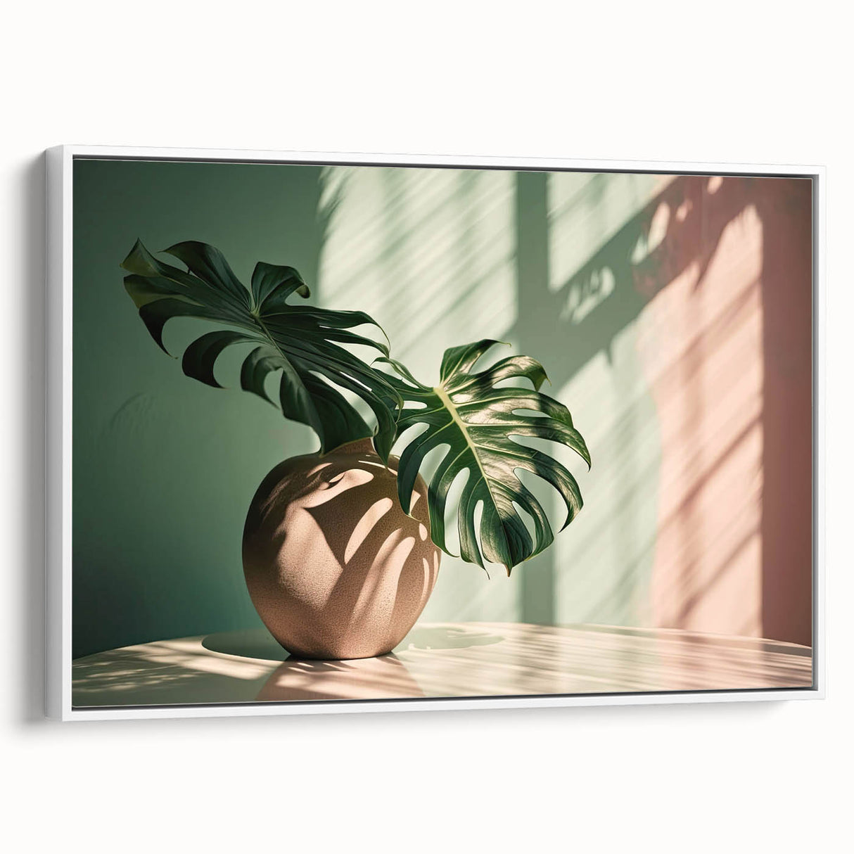 Framed canvas wall art featuring a botanical monstera design, showcasing vibrant green leaves on a white background, ideal for home decor.