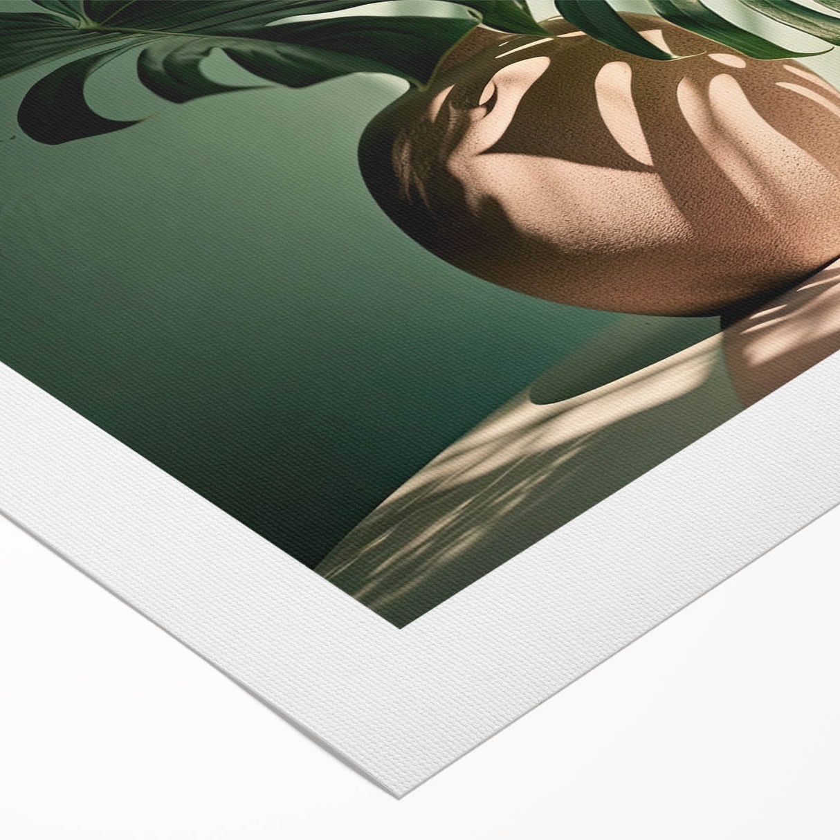 Botanical monstera design on rolled canvas wall art showcases vibrant green leaves with intricate details, perfect for adding a tropical touch to home decor.