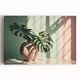 Botanical wall art featuring a vibrant Monstera leaf design on stretched canvas, showcasing rich green hues against a light background, ideal for home decor.