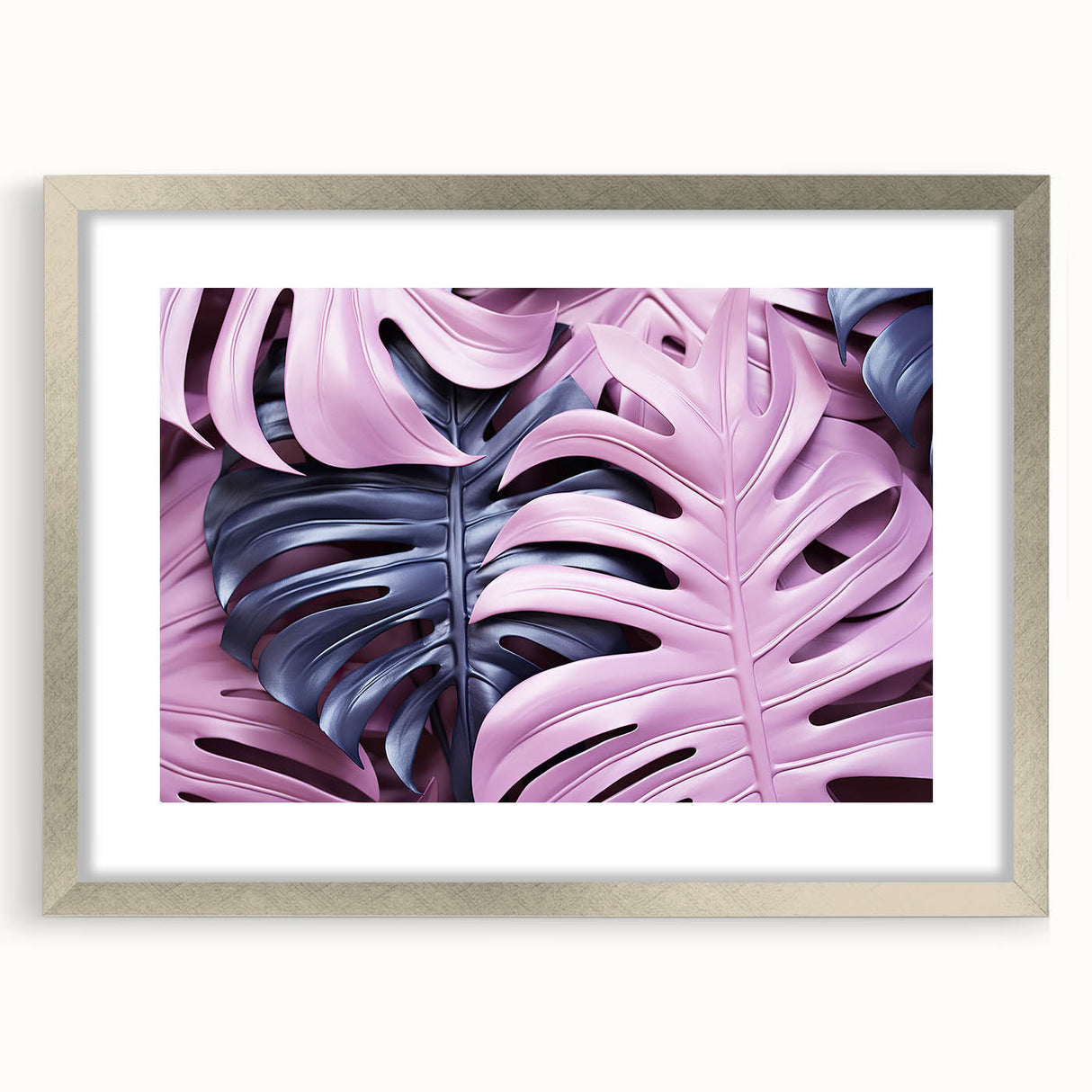 Botanical wall art print featuring a Monstera leaf design in a sleek silver frame with a white mat, perfect for modern home decor or nature-inspired settings.