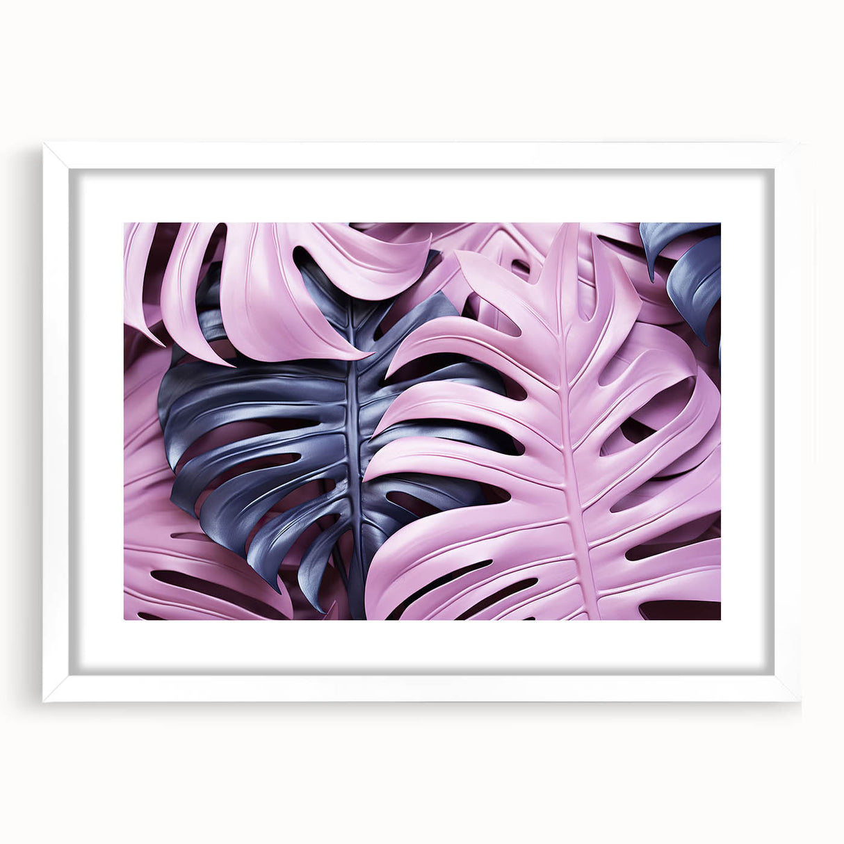 Framed botanical wall art featuring a vibrant monstera leaf design in a classic white frame with a mat, perfect for home decor and plant lovers.