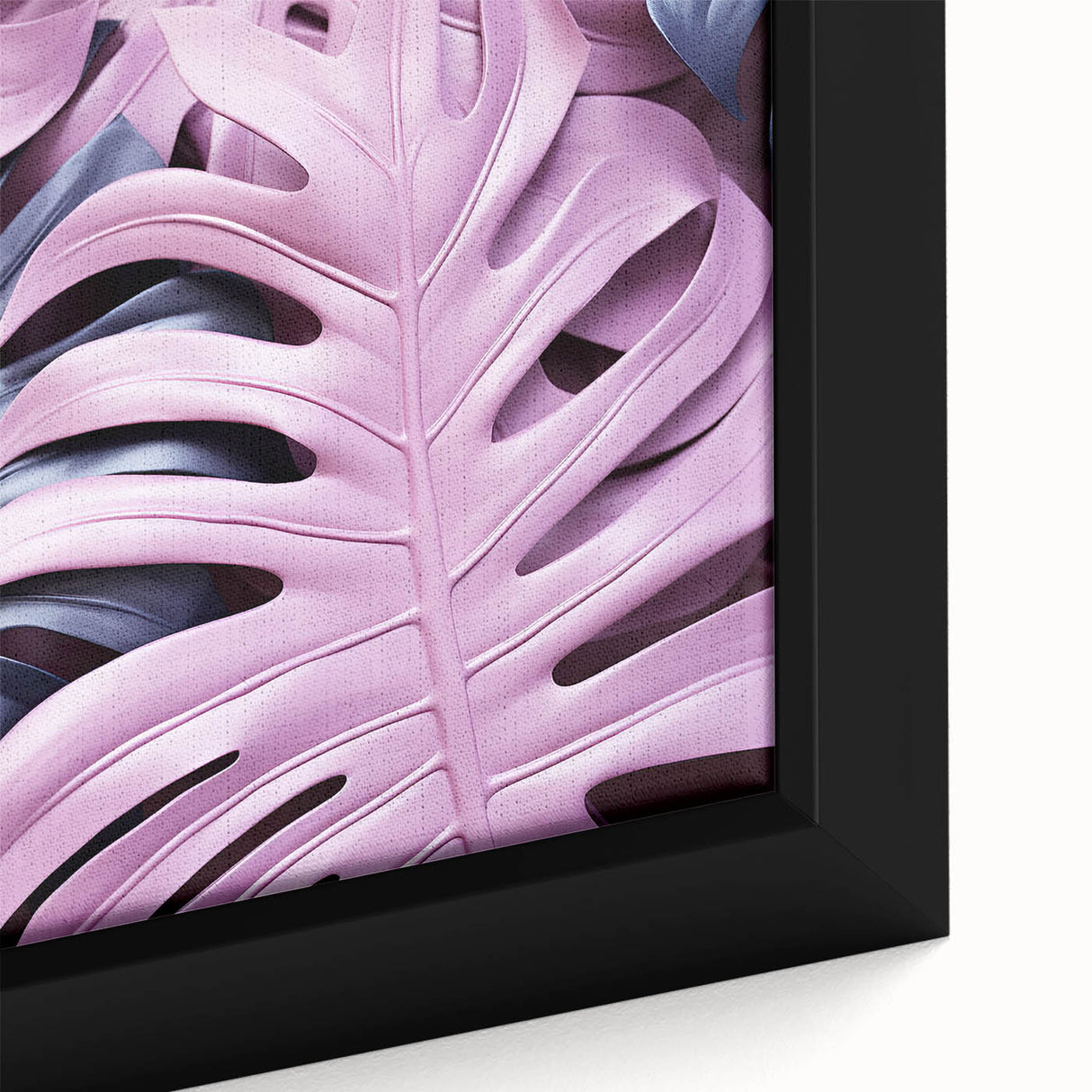 Close-up of a framed botanical art print featuring a vibrant monstera leaf design on textured canvas, ideal for home decor and nature-inspired interiors.
