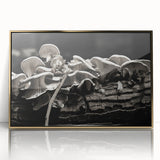 Framed botanical wall art featuring vibrant flowers and mushrooms design, set in an elegant gold frame, ideal for enhancing home decor aesthetics.