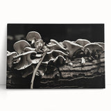 Botanical wall art design featuring vibrant flowers and mushrooms on a stretched canvas, perfect for adding a nature-inspired touch to home decor.