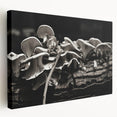 Stretched canvas wall art showcasing a vibrant botanical design featuring colorful flowers and mushrooms, presented in a side view with a textured finish. Perfect for adding a natural touch to home decor.