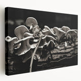 Stretched canvas wall art showcasing a vibrant botanical design featuring colorful flowers and mushrooms, presented in a side view with a textured finish. Perfect for adding a natural touch to home decor.