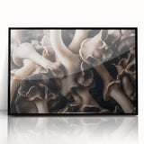 Framed wall art showcasing a botanical design of colorful flowers and mushrooms, with a sleek black frame, perfect for adding a touch of nature-inspired decor to any room.