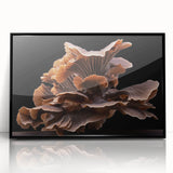 Framed wall art featuring a botanical design of colorful flowers and mushrooms, displayed in a sleek black frame, perfect for home decor enhancement.