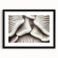 Black-framed botanical wall art featuring intricate flowers and mushrooms design, perfect for adding a natural aesthetic to home decor. Ideal for art enthusiasts and nature lovers.