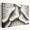 Stretched canvas wall art showcasing a vibrant botanical design of colorful flowers and mushrooms, featuring a side view that highlights its textured finish, perfect for home decor.