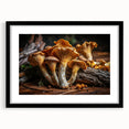Botanical wall art featuring vibrant flowers and mushrooms in an elegant black frame with a mat, perfect for adding a touch of nature to home decor.