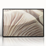 Framed wall art featuring a botanical design of colorful flowers and mushrooms, presented in a sleek black frame, adding a vibrant touch to home decor.