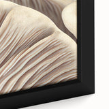 Close-up of a framed botanical wall art piece showcasing vibrant flowers and intricate mushrooms against a textured background, perfect for nature-themed decor.