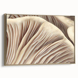 Framed wall art featuring a botanical design of colorful flowers and mushrooms on a textured canvas with a gold frame, showcasing vibrant nature-inspired decor.