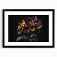 Black-framed wall art featuring a botanical orchid design, showcasing vibrant colors and intricate details, perfect for enhancing interior decor.