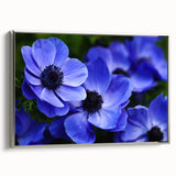 Framed canvas wall art showcasing a botanical pansy design with vibrant purple and yellow flowers, elegantly displayed in a silver frame, perfect for home decor.