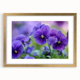 Botanical wall art featuring a vibrant pansy design framed in gold, showcasing intricate floral details and a mat finish, perfect for home decor.