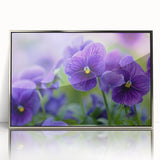 Framed wall art featuring a botanical pansy design in vibrant colors, set in a sleek silver frame, ideal for home decor and floral enthusiasts.