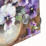 Close-up of a botanical wall art piece showcasing vibrant pansy flowers with intricate details, set against a sleek acrylic glass background, perfect for home decor.