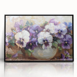 Framed botanical wall art featuring a vibrant pansy design with a black frame, showcasing intricate floral details against a neutral background, perfect for home decor.