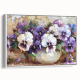 Framed canvas wall art featuring a botanical pansy design in vibrant colors, displayed against a white background, perfect for home decor enhancement.