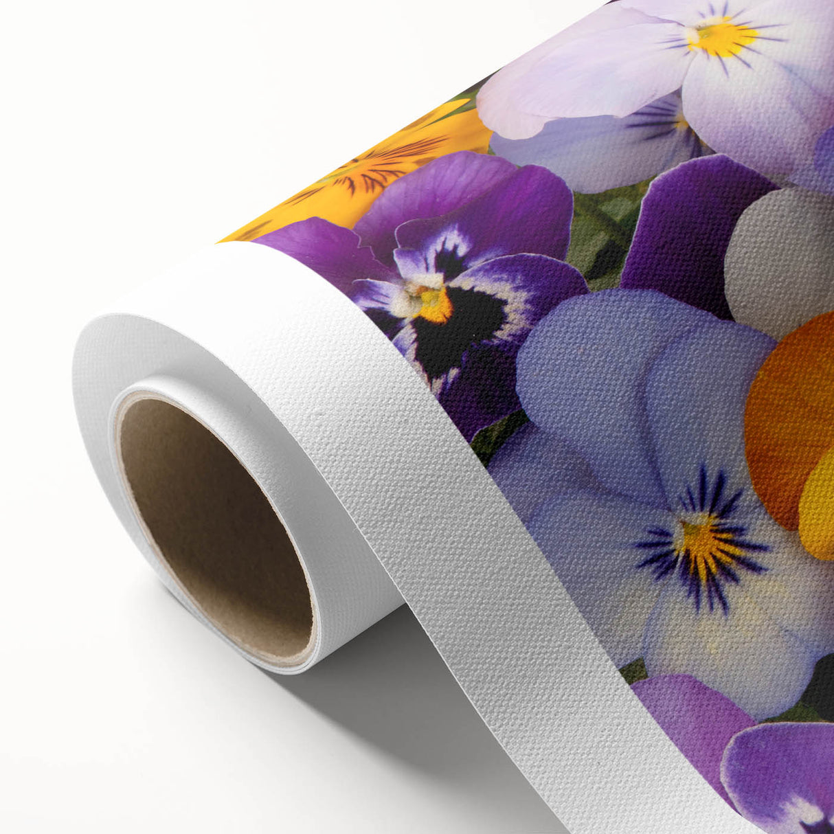 Rolled canvas print showcasing a vibrant botanical design featuring colorful pansies against a soft background, perfect for home decor or art collection.
