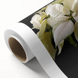 Vibrant rolled canvas wall art featuring a botanical design of red and green poinsettias, ideal for festive home decor. Perfect for adding a touch of nature and color to any room.