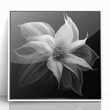 Framed wall art showcasing a vibrant botanical poinsettia design in rich reds and greens, set against a white background, perfect for holiday decor.