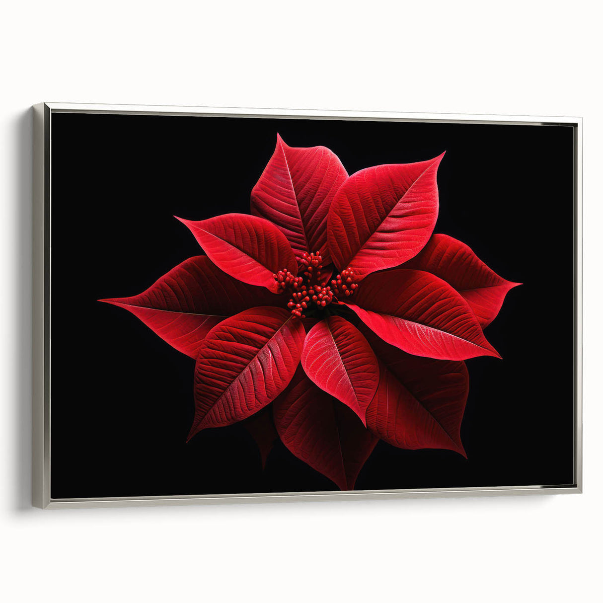 Framed canvas wall art showcasing a botanical poinsettia design in vibrant colors, featuring a sleek silver frame and a side view perspective, perfect for home decor.