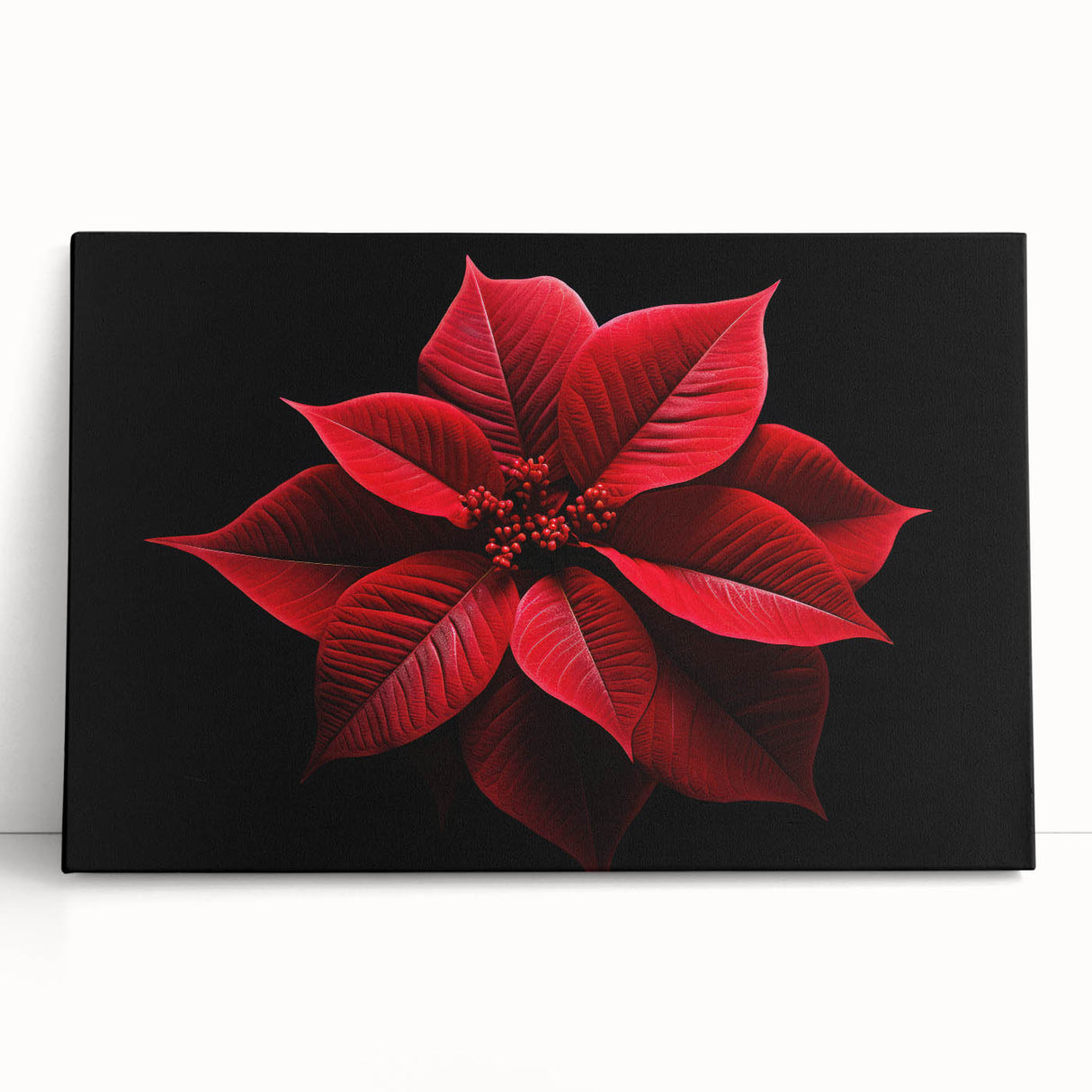 Stretched canvas artwork showcasing a vibrant botanical poinsettia design, elegantly leaning against a neutral backdrop, perfect for enhancing home decor.