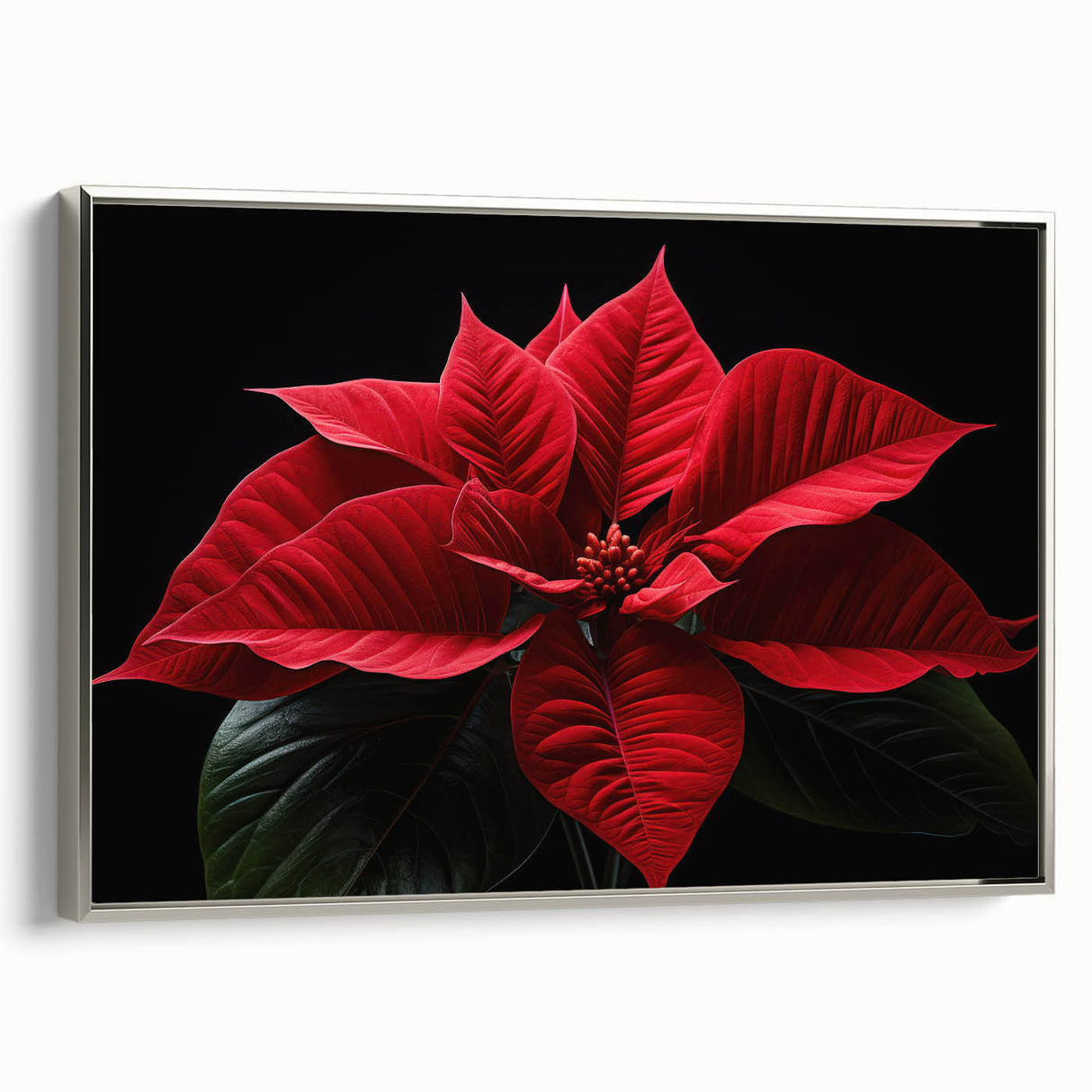 Framed canvas wall art featuring a botanical poinsettia design in vibrant red and green, set in a silver frame, showcasing floral elegance for home decor.