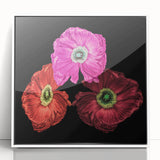 Framed botanical wall art featuring a vibrant poppy design, set against a sleek white background, ideal for enhancing modern home decor and adding a touch of nature.
