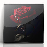 Framed wall art showcasing a botanical rose design with vibrant colors, featuring a sleek black frame, ideal for home decor or floral-themed interiors.