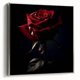 Framed botanical rose wall art in a silver frame, showcasing vibrant pink and green floral details, perfect for enhancing any home decor style.