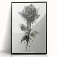 Framed wall art display featuring a botanical rose design in vibrant colors, set in a sleek black frame, ideal for home decor or floral-themed interiors.