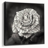 Framed canvas wall art showcasing a botanical rose design in vibrant colors, featuring a sleek black frame and a side view to highlight its depth and elegance. Perfect for home decor enthusiasts seeking floral-themed artwork.