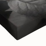 Close-up of a botanical rose design stretched canvas wall art piece, showcasing vibrant pink and green hues, perfect for home decor enthusiasts seeking floral elegance.