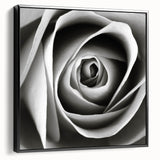 Framed botanical wall art featuring a detailed rose design on canvas, displayed against a black background, showcasing elegance and sophistication in home decor.
