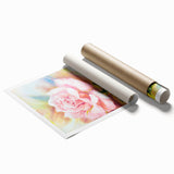 Botanical rose wall art print showcasing intricately detailed flowers in soft pastel colors, ideal for home decor, elegantly rolled for easy display.