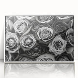 Framed wall art featuring a botanical rose design in vibrant colors, set against a white background, perfect for enhancing home decor with a touch of nature.