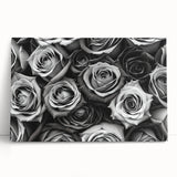 Stretched canvas wall art featuring a botanical rose design in vibrant colors, elegantly leaning against a neutral backdrop, perfect for home decor.