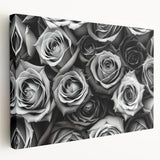 Stretched canvas wall art showcasing a botanical rose design in soft pink and green hues, elegantly displayed in a side view to highlight its depth and texture. Perfect for enhancing home decor with a floral theme.