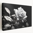 Stretched canvas wall art showcasing a botanical rose design, featuring vibrant pink and green hues, ideal for home decor, displayed in a side view.