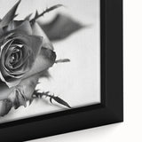 Close-up of a framed botanical rose wall art piece, showcasing intricate floral details and vibrant colors on a textured canvas, ideal for home decor.