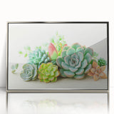 Framed wall art showcasing a vibrant botanical design featuring succulents, presented in a sleek silver frame, perfect for modern home decor.