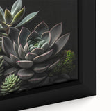 Close-up of a framed botanical wall art piece showcasing a vibrant collection of succulents, featuring lush greens and subtle pinks, perfect for home decor.